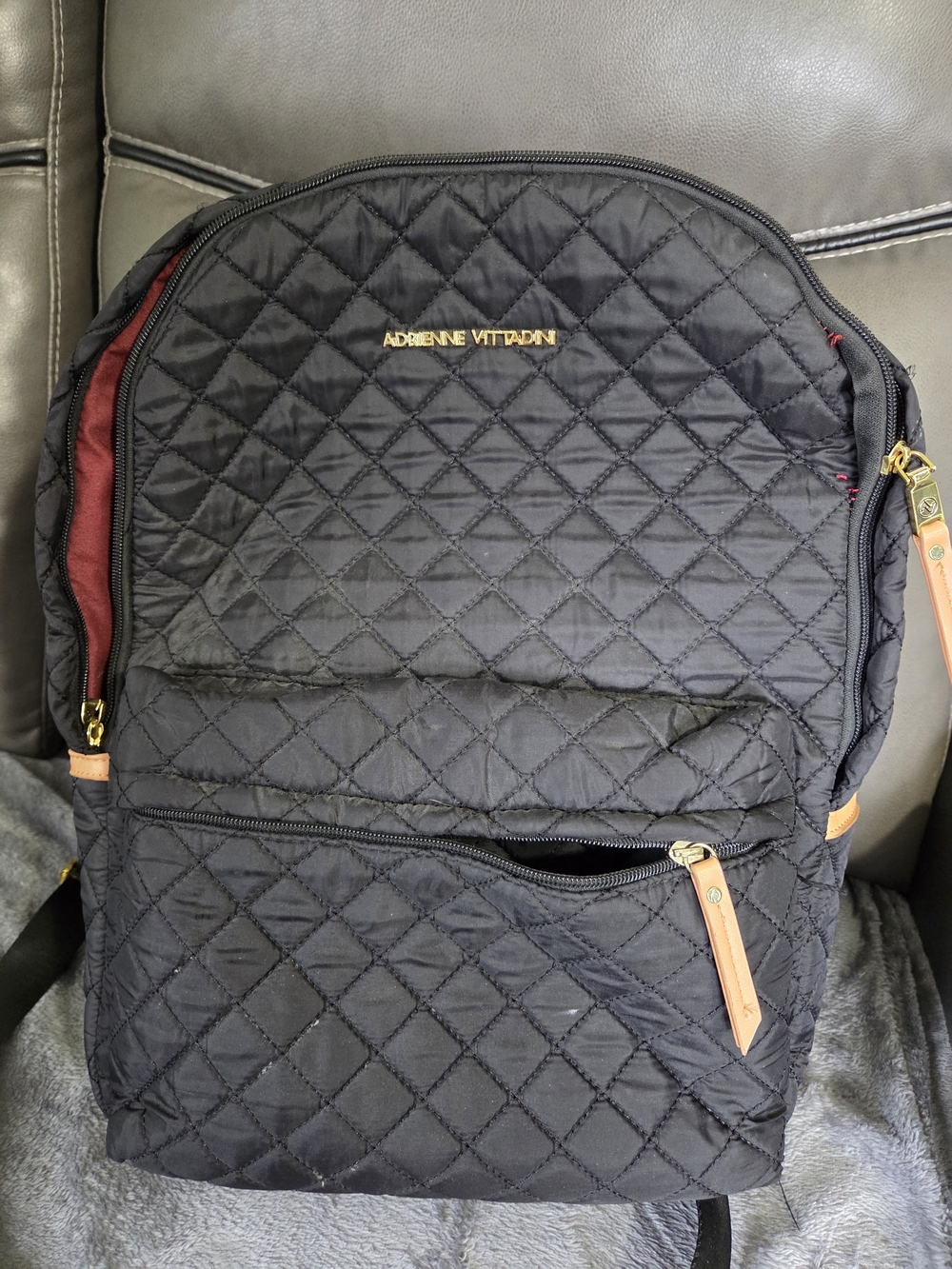 Adrienne Vittadini Black Quilted Backpack with Tan Pulls and Burgundy Lining